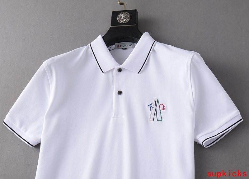 Full styled look of Moncler luxury clothing with logo-detail design
