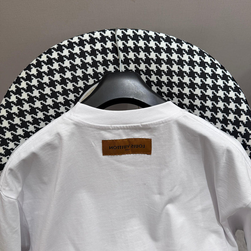 Close-up detail shot of Louis Vuitton cotton t-shirt with logo-detail design