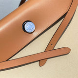 Side view of graceful structured handbag