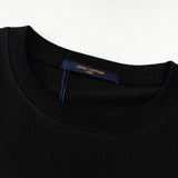 Flat lay presentation of Louis Vuitton cotton t-shirt with contemporary cut