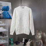 Full styled look of Louis Vuitton luxury clothing with tailored silhouette