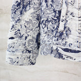 Close-up detail shot of Louis Vuitton luxury clothing with relaxed-fit cut