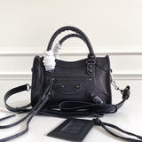 Zivas Charm Modern Minimalist Look Statement Handbag (Signature Shape & Finish) – Angled View