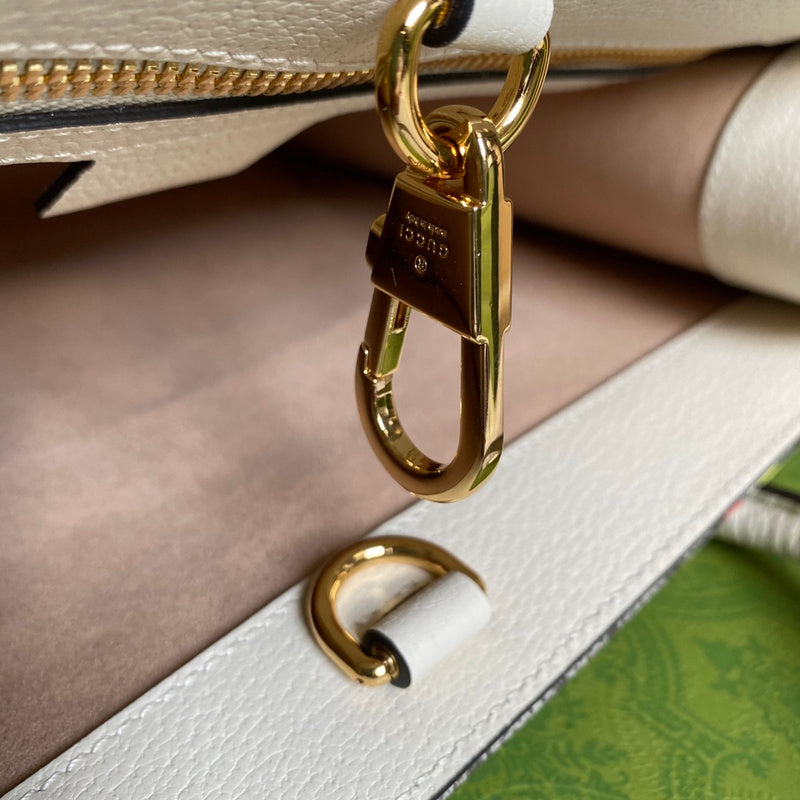 Side profile of classic everyday-luxe women's handbag – women's statement bag