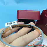 Angled view of Cartier unisex jewelry piece