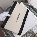 Handle and strap detail of structured statement women's handbag – women's everyday handbag