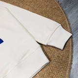 Back view of Gucci luxury clothing with monogram-inspired silhouette