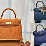  signature top-handle bag styled with outfit