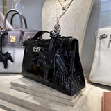  Graceful top-handle bag carried on shoulder