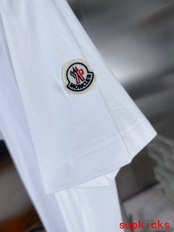 Back view of Moncler luxury clothing with signature branding