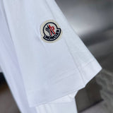 Back view of Moncler luxury clothing with signature branding