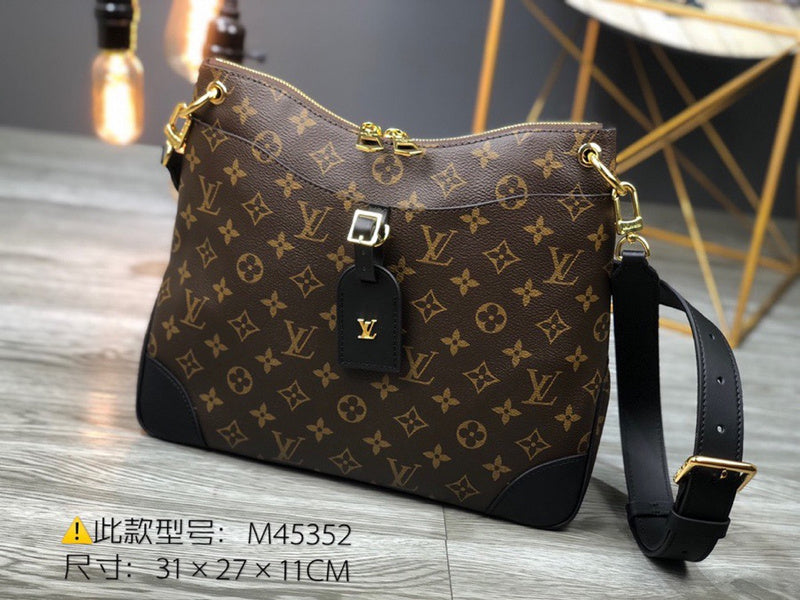 Front view of classic sleek women's handbag – women's statement bag