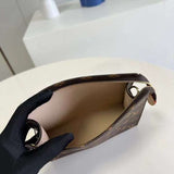 Styled lifestyle shot of refined structured women's handbag – women's designer-style accessory