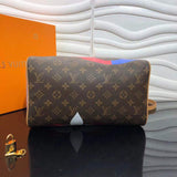 Styled lifestyle shot of signature polished women's handbag – women's luxury accessory
