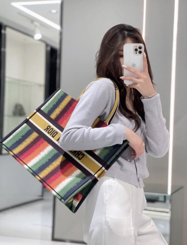 Styled lifestyle shot of modern statement women's handbag – women's luxury accessory