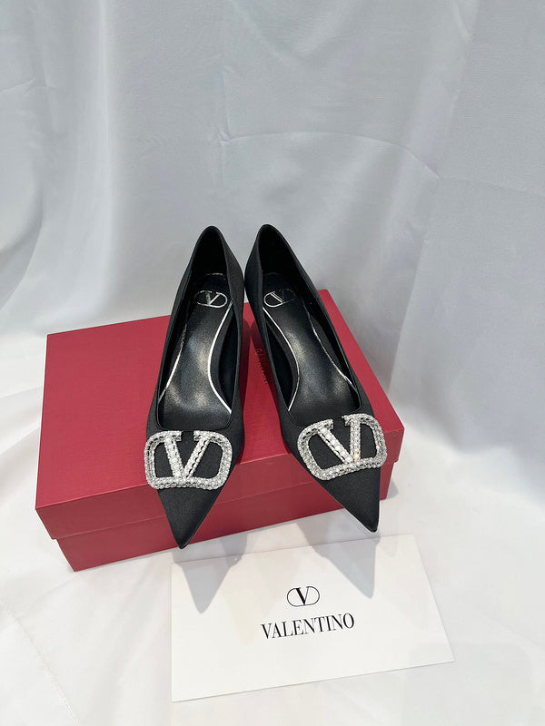 Texture and finish detail of Valentino Garavani luxury piece style No.216