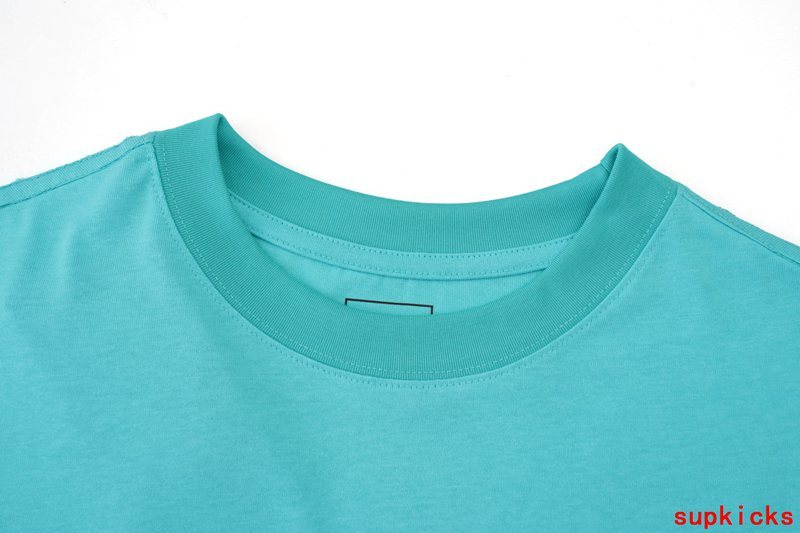 Close-up detail shot of Rhude luxury clothing with logo-detail design
