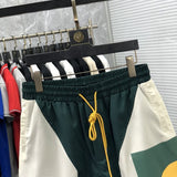 Close-up detail shot of Rhude luxury clothing with streetwear-inspired cut