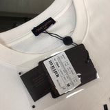 Full styled look of Louis Vuitton cotton t-shirt with runway-inspired design