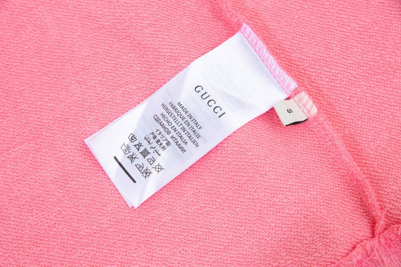Close-up detail shot of Gucci luxury clothing with streetwear-inspired cut