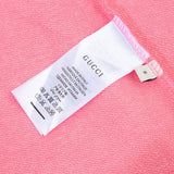 Close-up detail shot of Gucci luxury clothing with streetwear-inspired cut