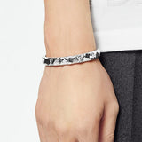 Close-up detail view of Cartier unisex jewelry piece