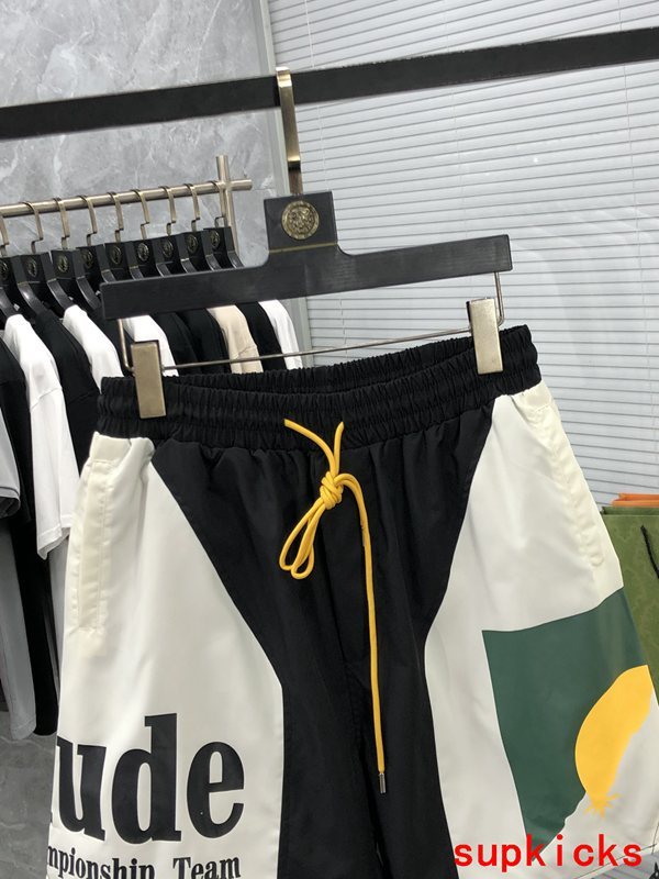 Close-up detail shot of Rhude luxury clothing with streetwear-inspired cut