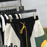 Close-up detail shot of Rhude luxury clothing with streetwear-inspired cut