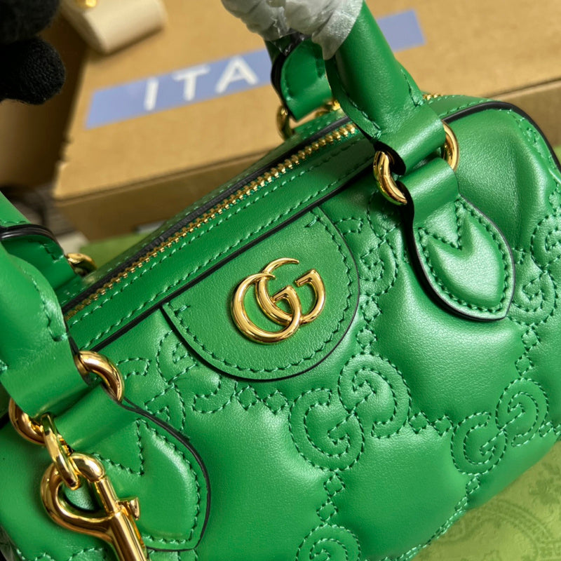 Back view of chic polished women's handbag – women's statement bag