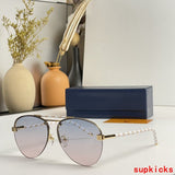 Side view of Louis Vuitton unisex sunglasses