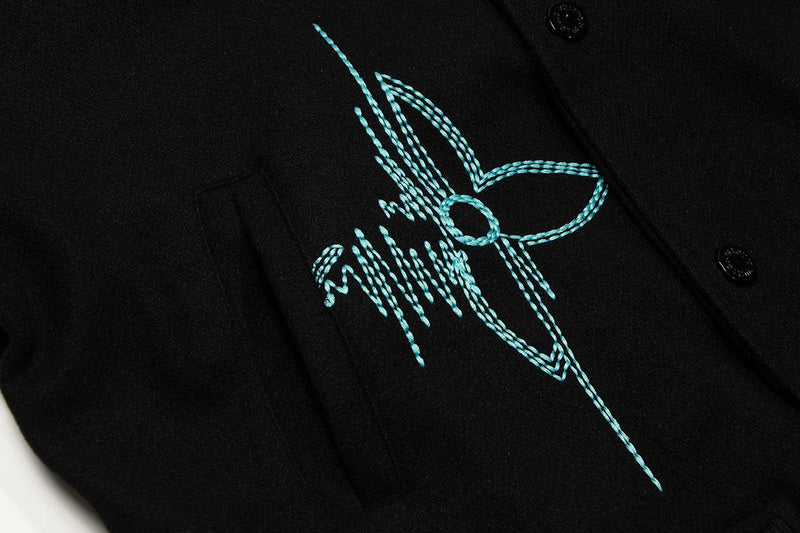 Back view of Louis Vuitton luxury clothing with signature branding