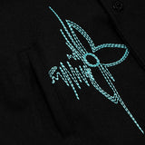 Back view of Louis Vuitton luxury clothing with signature branding