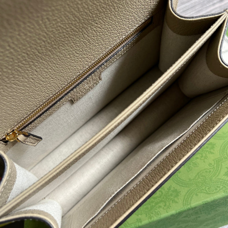 Side profile of signature premium women's handbag – women's luxury accessory