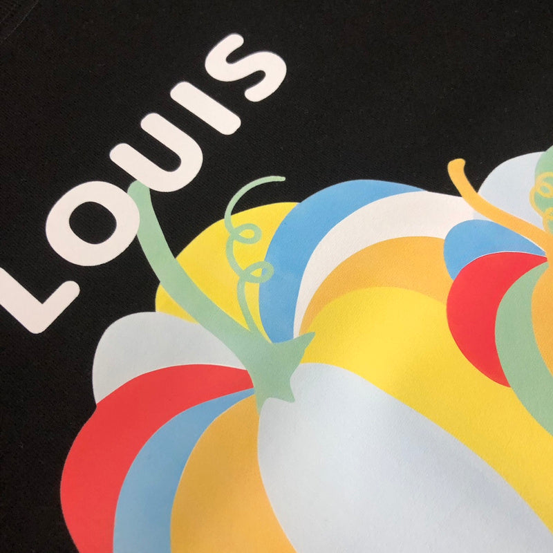 Flat lay presentation of Louis Vuitton luxury clothing with tailored silhouette