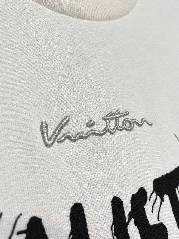 Back view of Louis Vuitton luxury clothing with signature branding