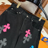 Chrome Hearts Jeans flat lay on neutral background
