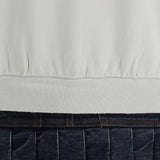 Close-up of Balenciaga cocktail dresses hardware and fine stitching