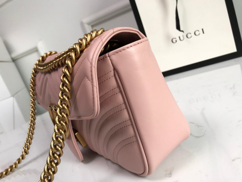Handle and strap detail of polished signature women's handbag – women's statement bag