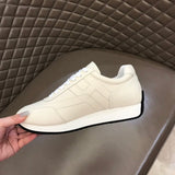 Hermès Red Slip-On Sneakers - Heel Detail View