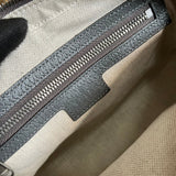 Side view of graceful structured handbag