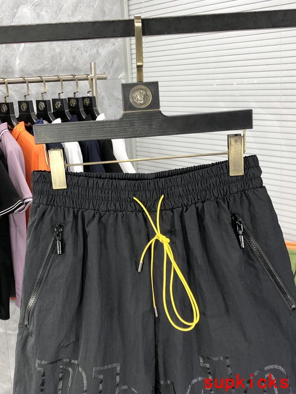 Close-up detail shot of Rhude luxury clothing with runway-inspired design