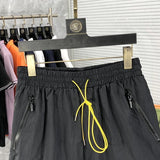 Close-up detail shot of Rhude luxury clothing with runway-inspired design