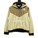 Back view of Gucci luxury clothing with label-forward styling