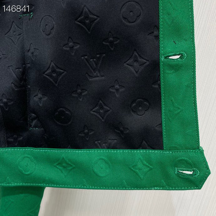 Back view of Louis Vuitton luxury clothing with tailored silhouette