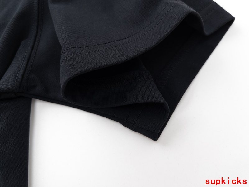 Flat lay presentation of Moncler luxury clothing with logo-detail design