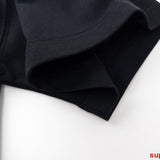 Flat lay presentation of Moncler luxury clothing with logo-detail design