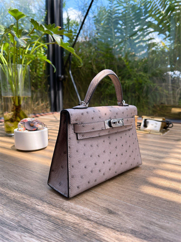  Elegant top-handle bag front view 7