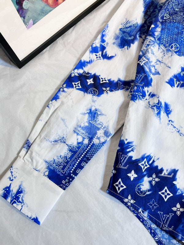 Flat lay presentation of Louis Vuitton luxury clothing with everyday silhouette