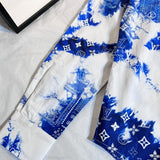 Flat lay presentation of Louis Vuitton luxury clothing with everyday silhouette