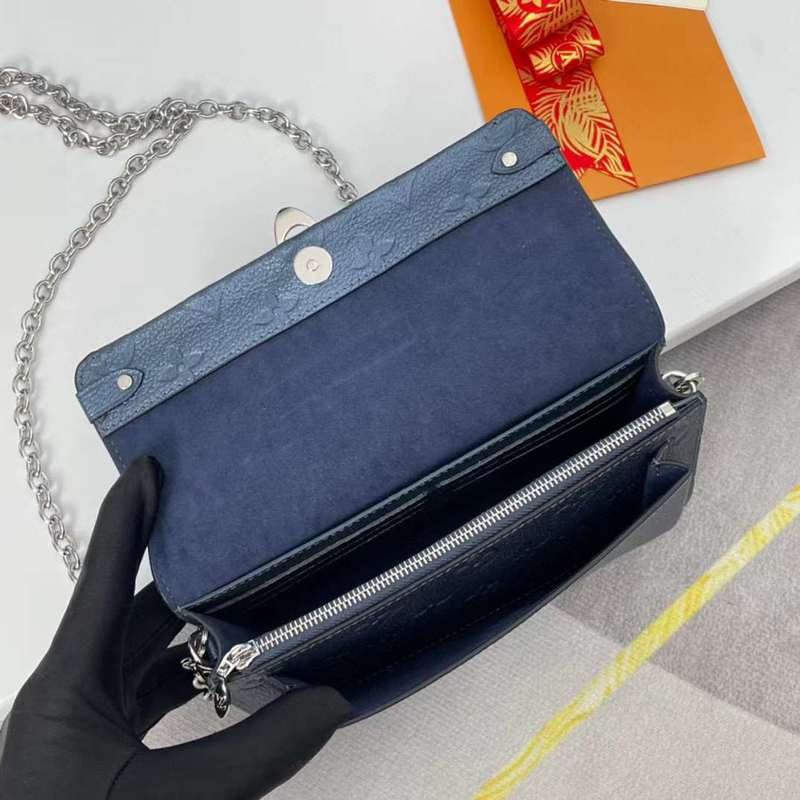 Close-up detail of sleek polished women's handbag – women's statement bag